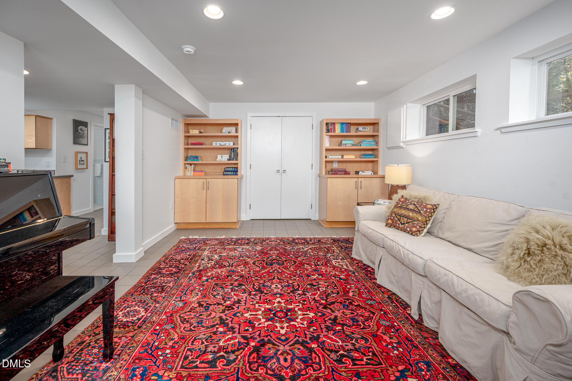 1030 Highland Woods Road Chapel Hill, NC 27517 - Photo 52 of 64 a living room with furniture and a rug