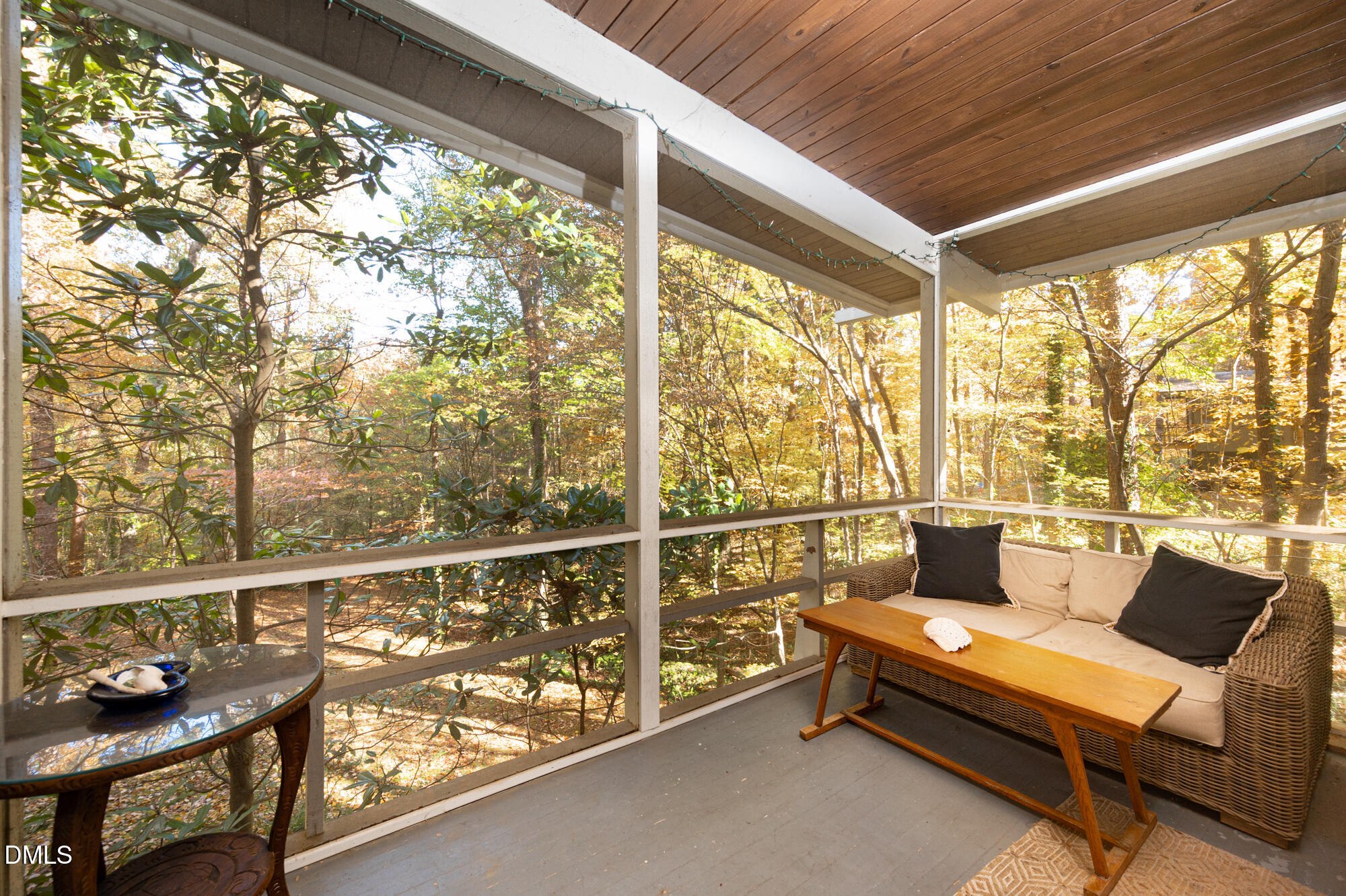 1030 Highland Woods Road Chapel Hill, NC 27517 - Photo 9 of 64 a balcony with furniture and a window