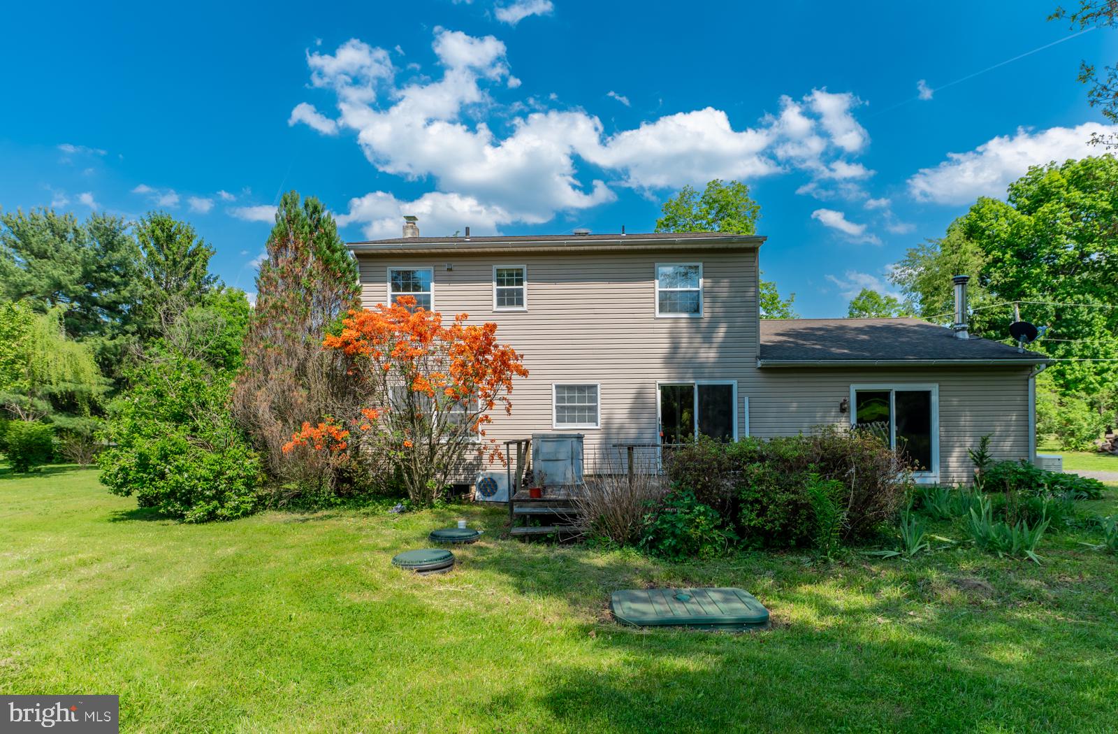 223 Trythall Road Elverson, PA 19520 - Photo 71 of 78 a front view of a house with a yard