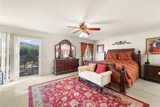 a view of a balcony with wooden floor and outdoor space