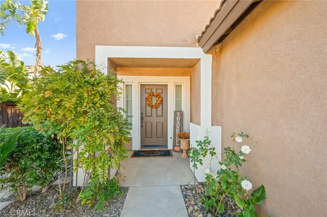 a living room with furniture rug and window