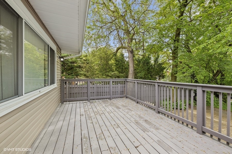 369 Blackhawk Road Riverside, IL 60546 - Photo 24 of 31 a view of balcony with wooden floor