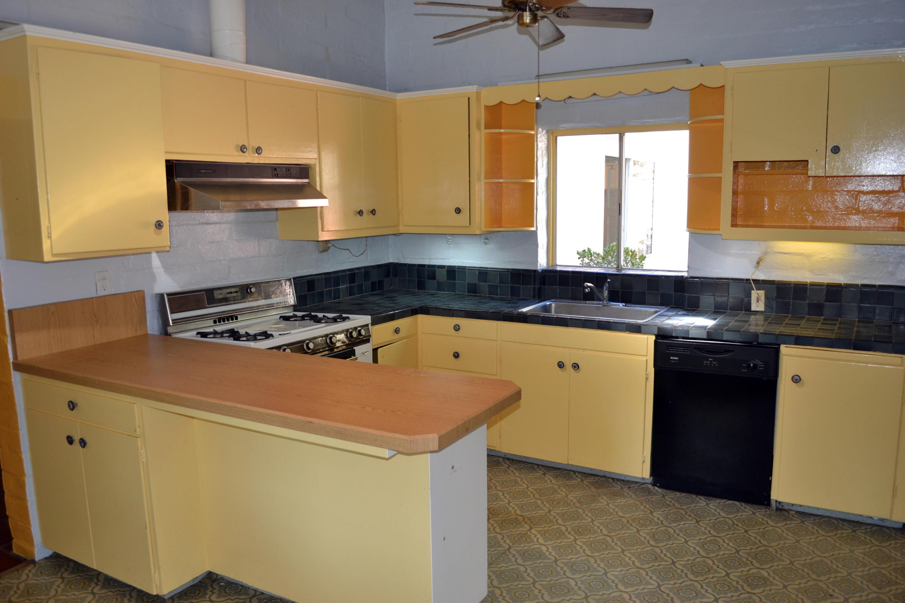 2018 Foothill Road Santa Barbara, CA 93105 - Photo 6 of 15 a kitchen with a sink a stove and cabinets