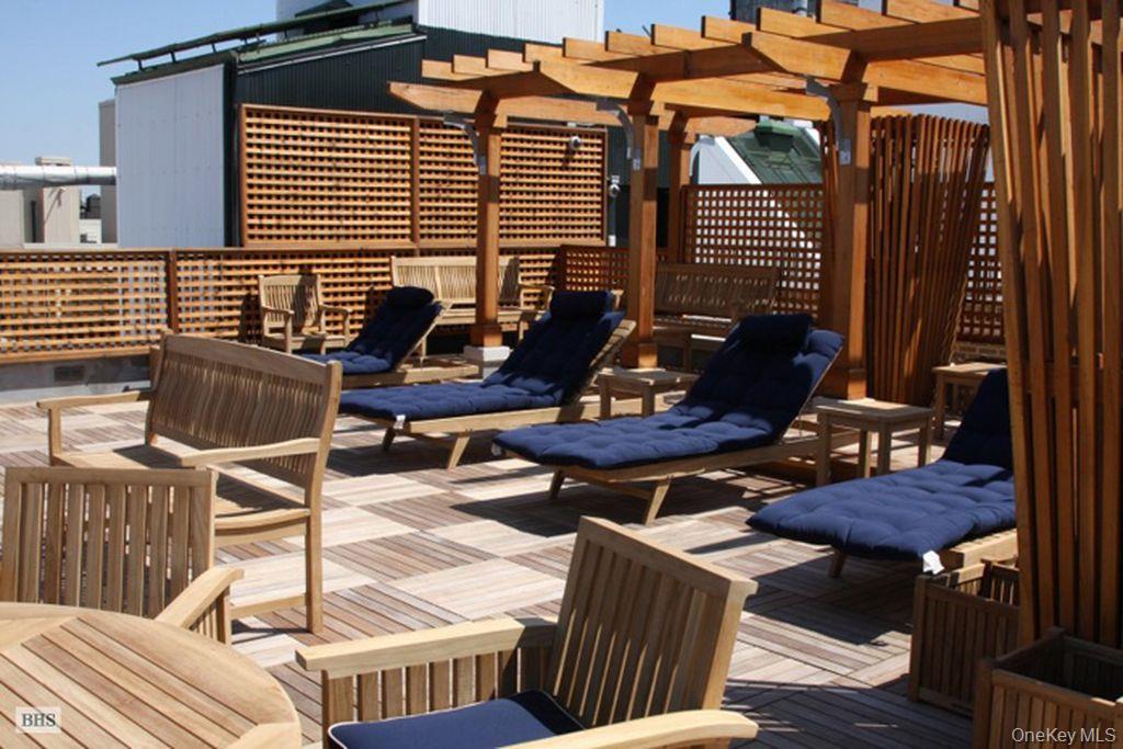 390 Riverside Drive, Unit 12AC Manhattan, NY 10025 - Photo 19 of 29 Wooden terrace with a pergola