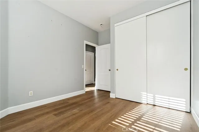 a view of a patio with a table and chairs