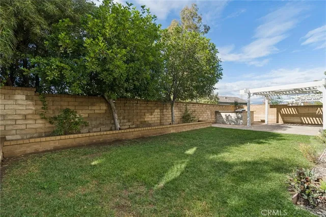 an aerial view of residential house with outdoor space