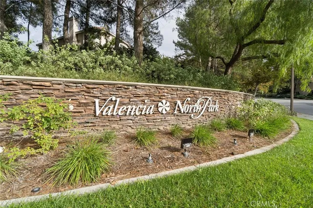 an aerial view of a pool table and chairs