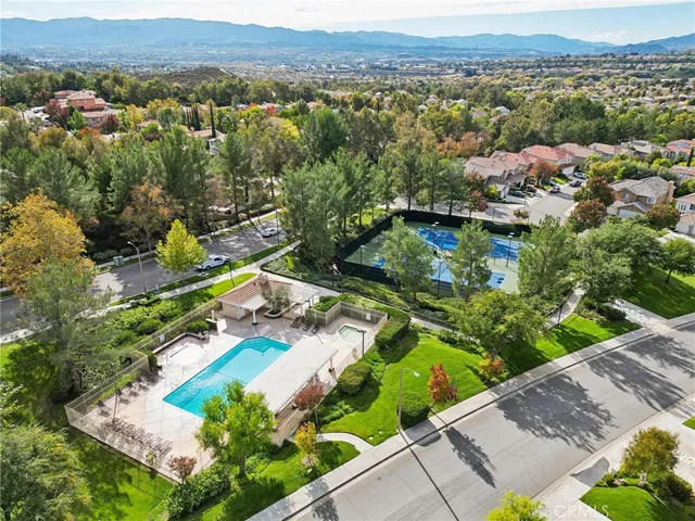 a front view of house with yard outdoor seating and green space