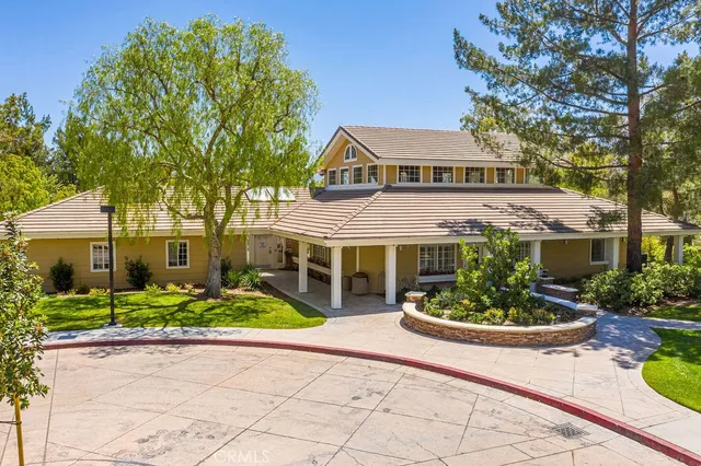 a view of swimming pool with outdoor seating and yard