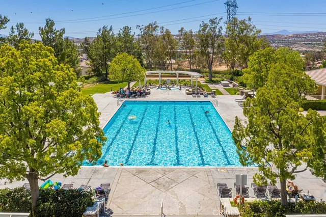 a view of a park with large trees