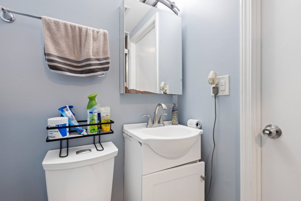2004 East Parkview Circle Hoffman Estates, IL 60169 - Photo 31 of 36 a bathroom with a sink a washer and dryer