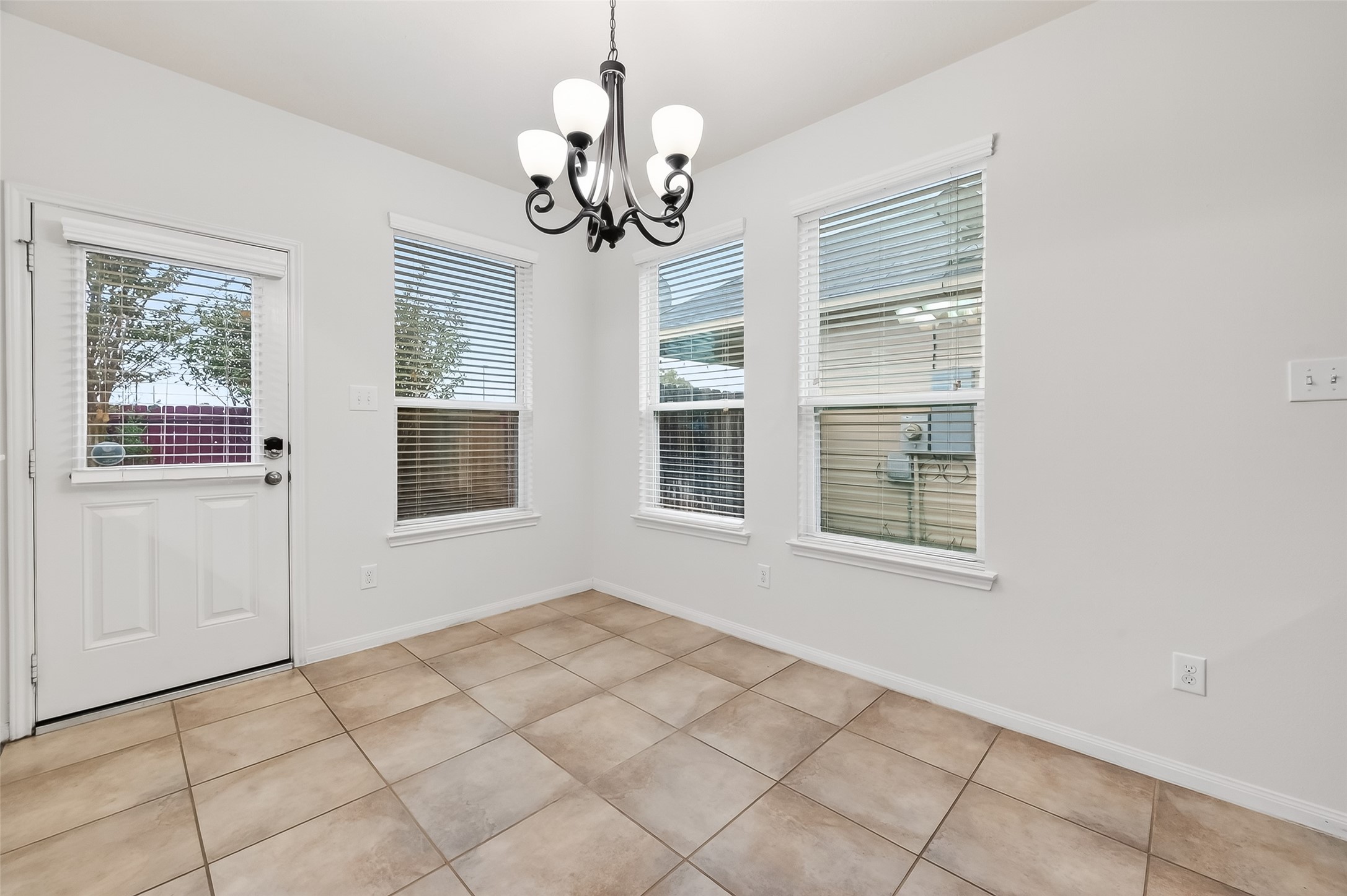 25018 Clover Ranch Drive Katy, TX 77494 - Photo 18 of 45 a view of an empty room with a window