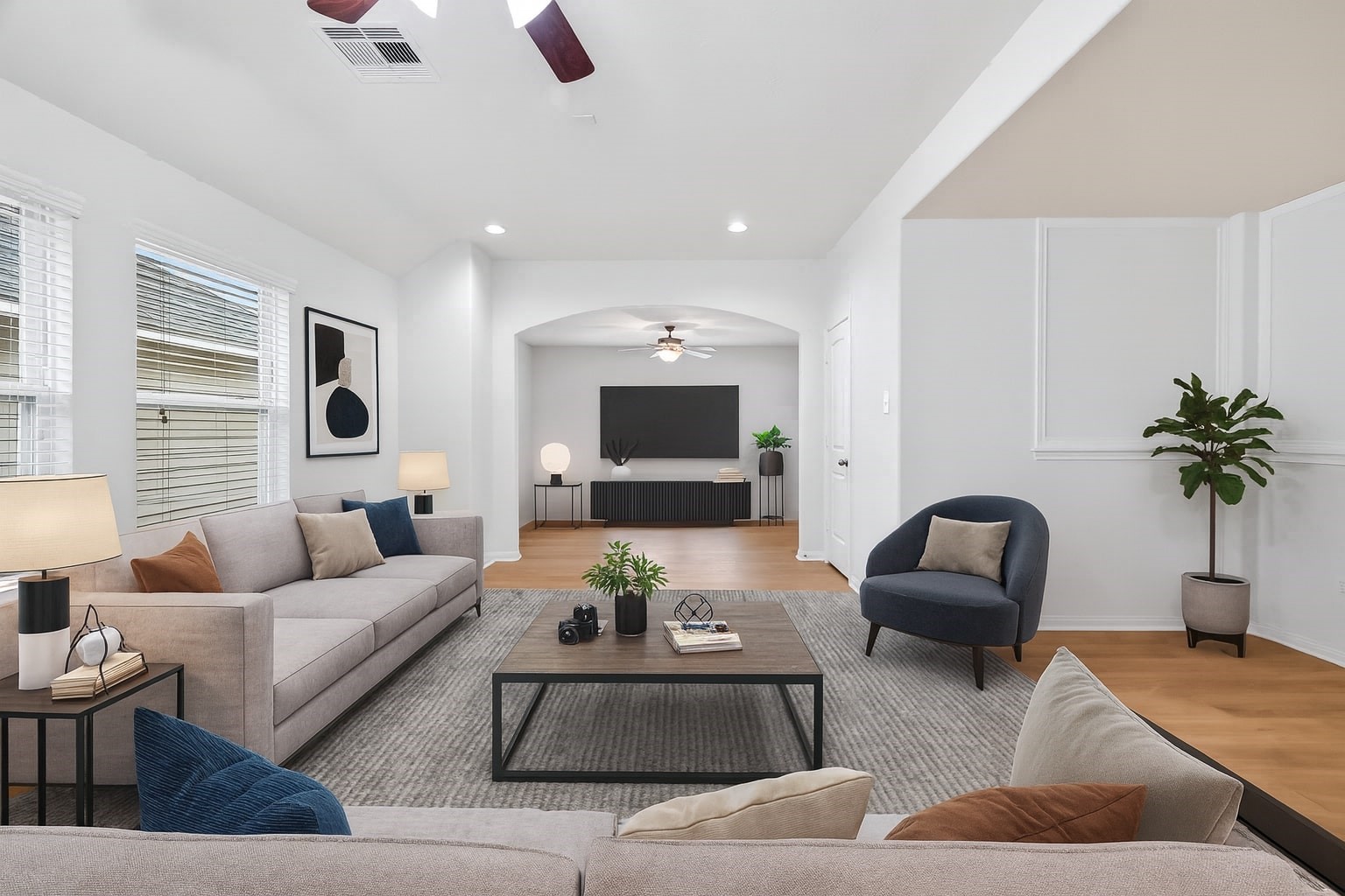 25018 Clover Ranch Drive Katy, TX 77494 - Photo 2 of 45 a living room with furniture and a flat screen tv
