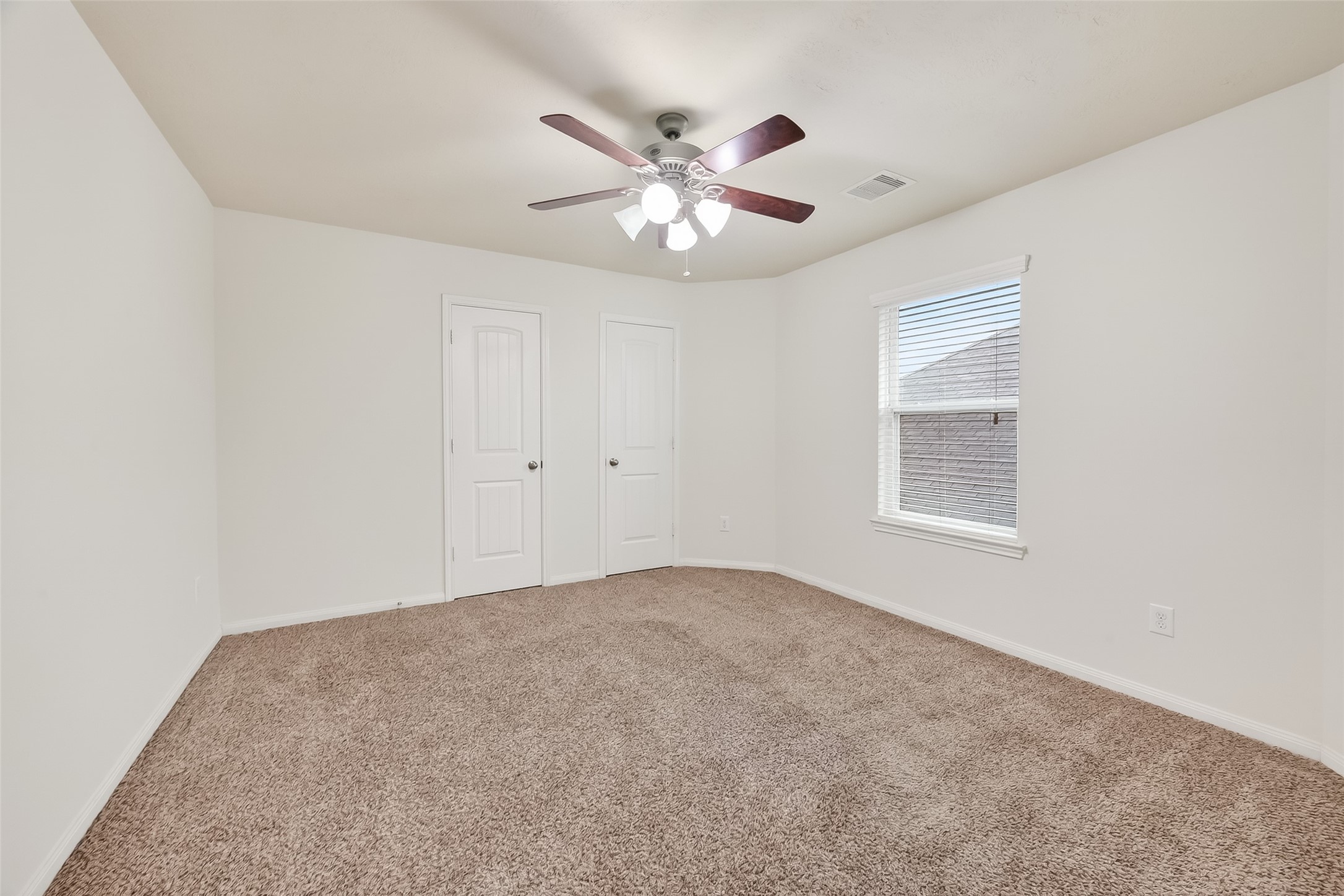 25018 Clover Ranch Drive Katy, TX 77494 - Photo 36 of 45 a view of an empty room with a window
