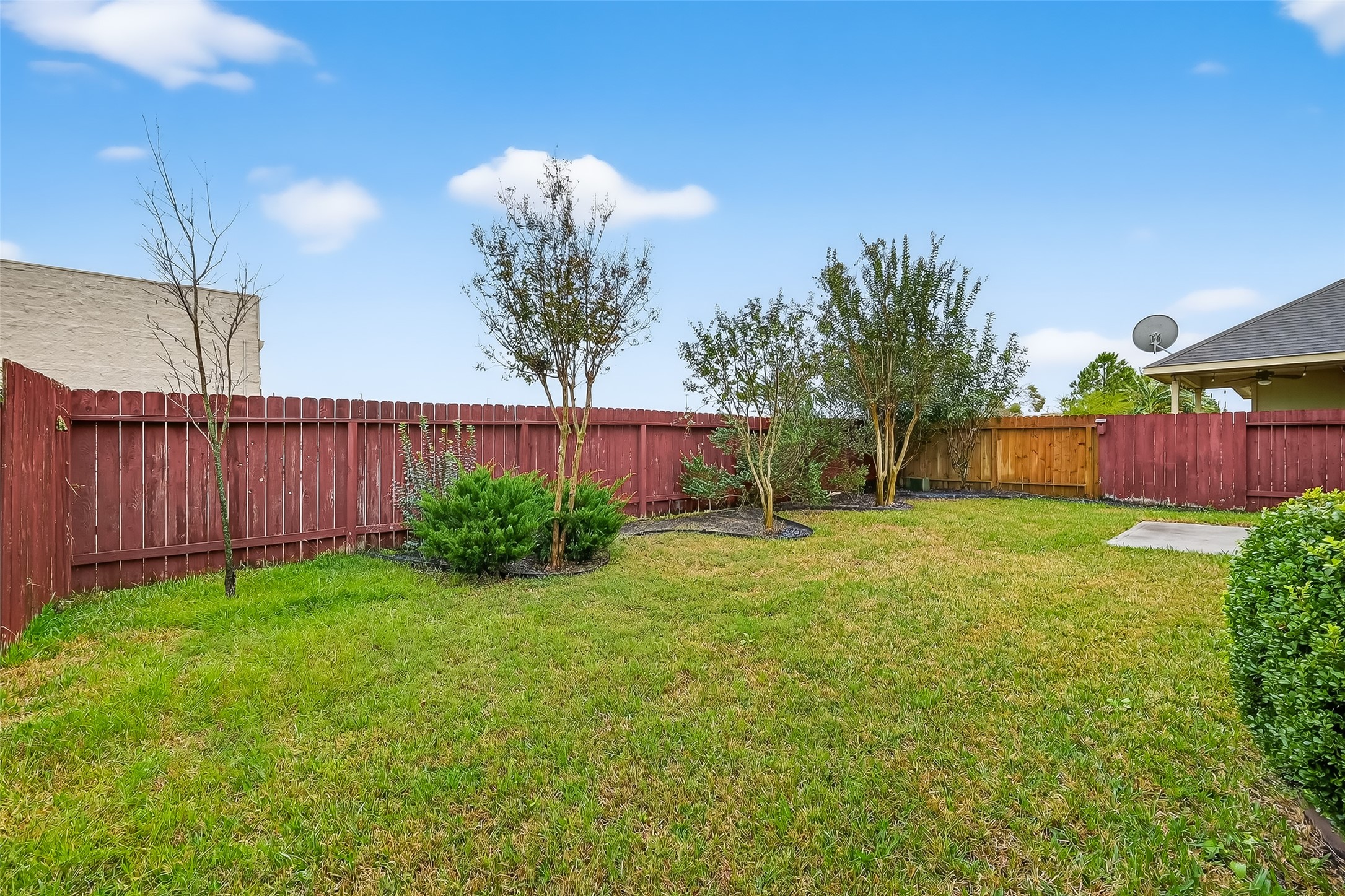 25018 Clover Ranch Drive Katy, TX 77494 - Photo 43 of 45 a view of a house with backyard and garden