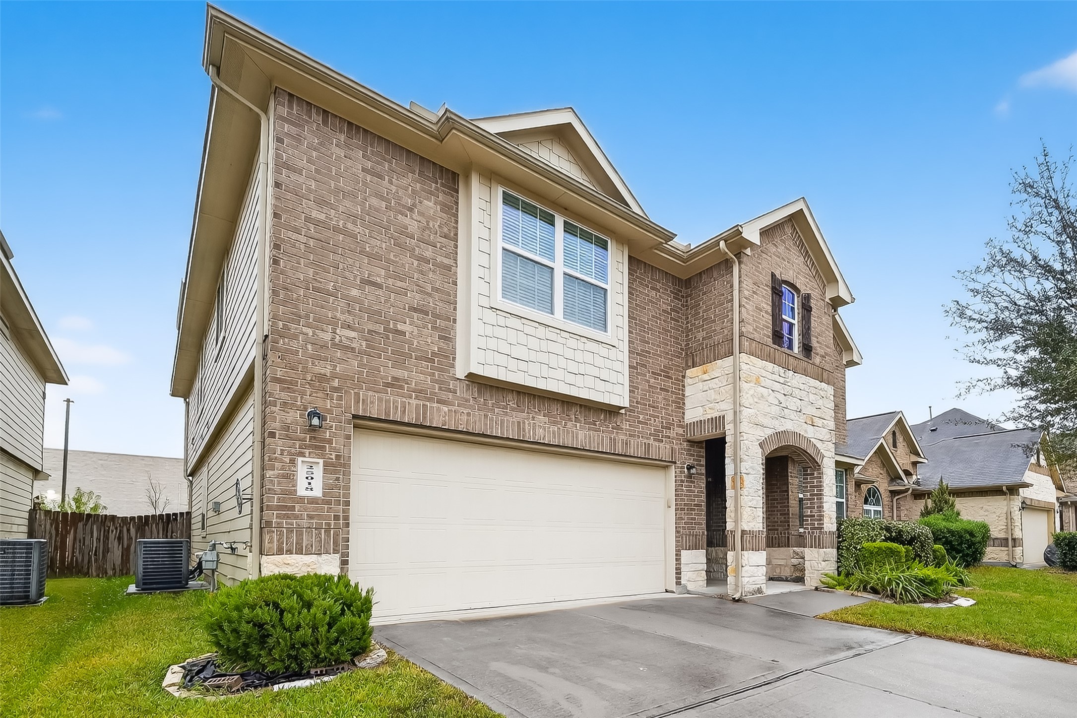 25018 Clover Ranch Drive Katy, TX 77494 - Photo 44 of 45 a front view of a house with garden