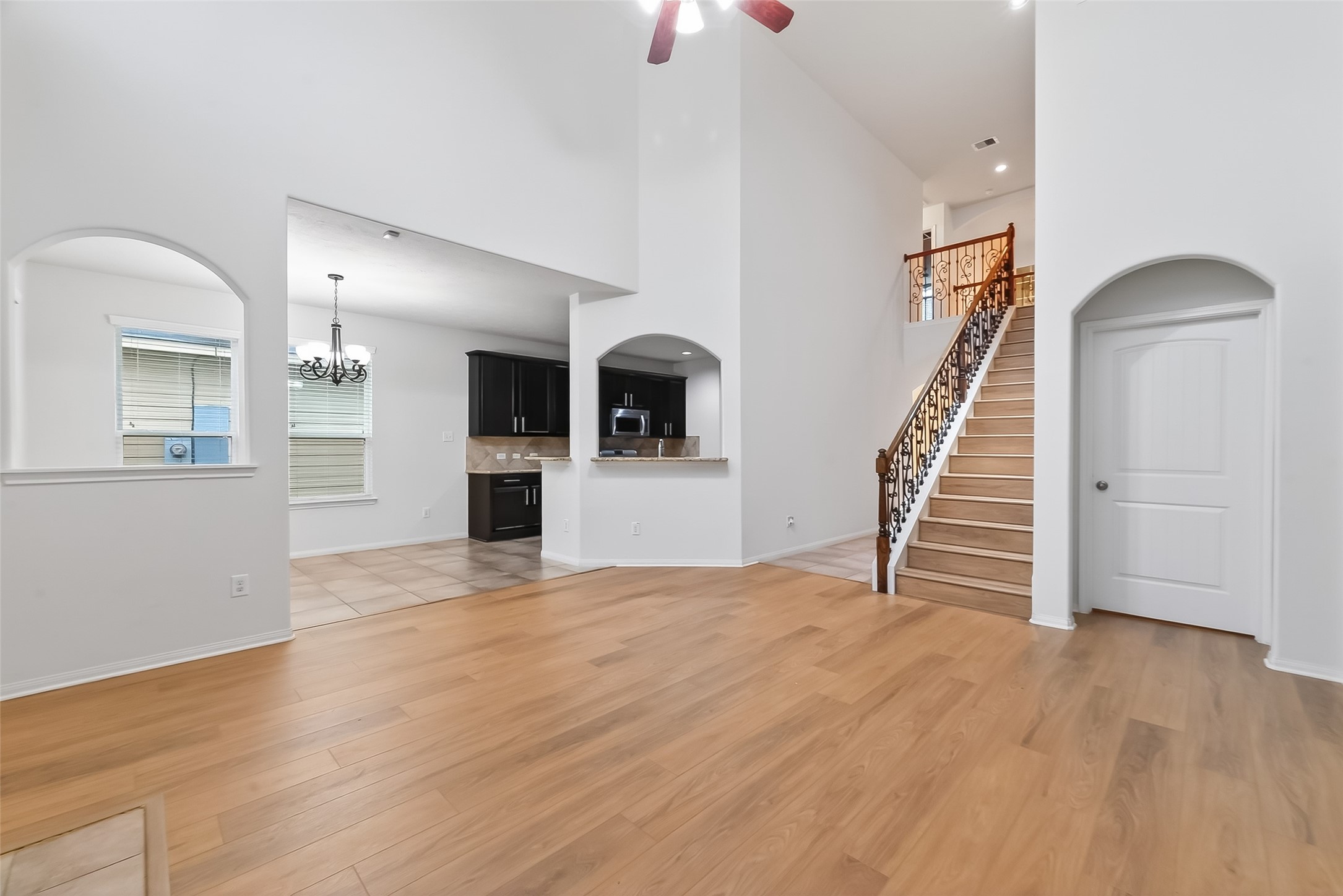 25018 Clover Ranch Drive Katy, TX 77494 - Photo 8 of 45 a view of a livingroom with wooden floor and staircase