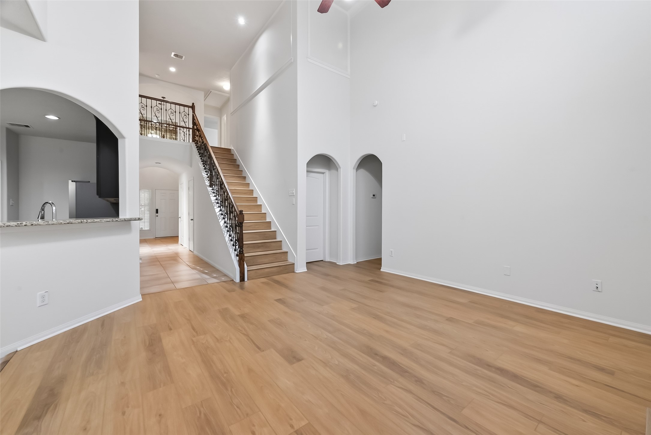 25018 Clover Ranch Drive Katy, TX 77494 - Photo 9 of 45 a view of an empty room with stairs