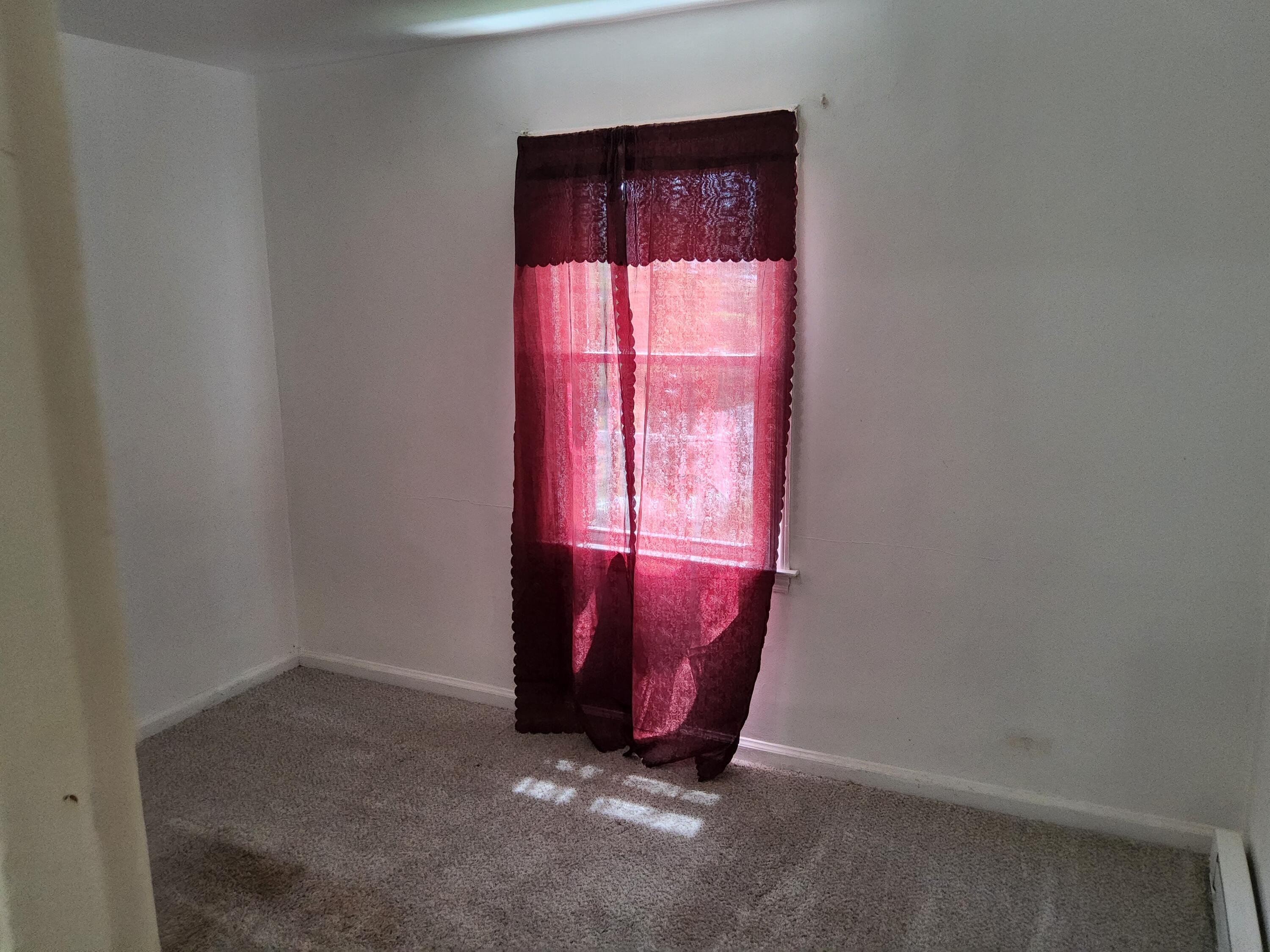 4935 Fralin Road Northwest Roanoke, VA 24012 - Photo 12 of 16 an empty room with windows