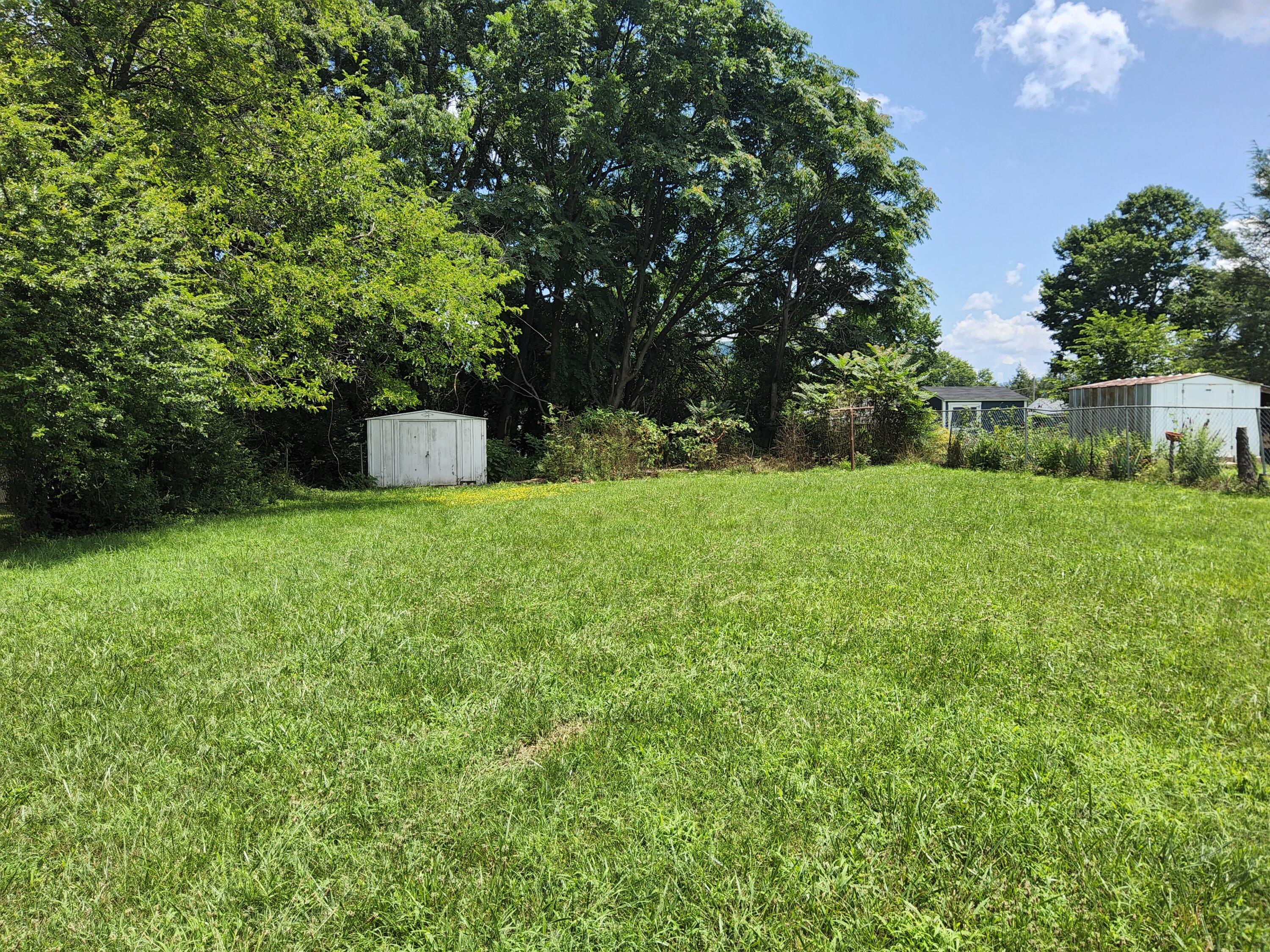 4935 Fralin Road Northwest Roanoke, VA 24012 - Photo 16 of 16 a view of a tree with a house
