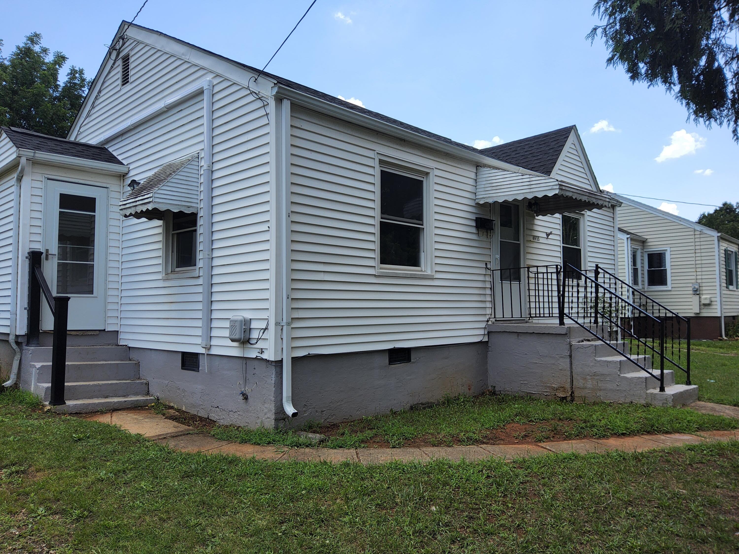 4935 Fralin Road Northwest Roanoke, VA 24012 - Photo 2 of 16 a view of a house with a yard