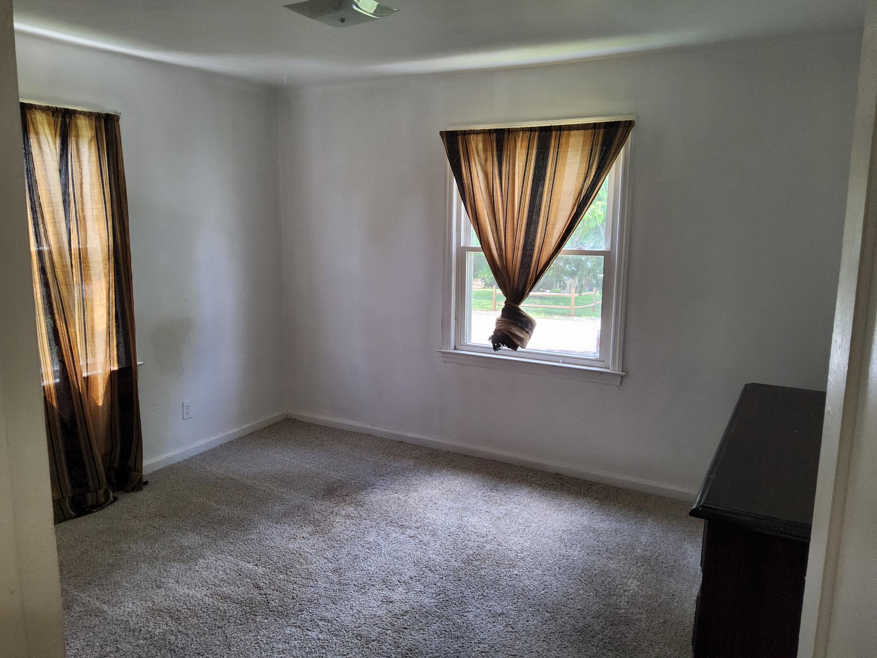4935 Fralin Road Northwest Roanoke, VA 24012 - Photo 10 of 16 an empty room with windows and closet