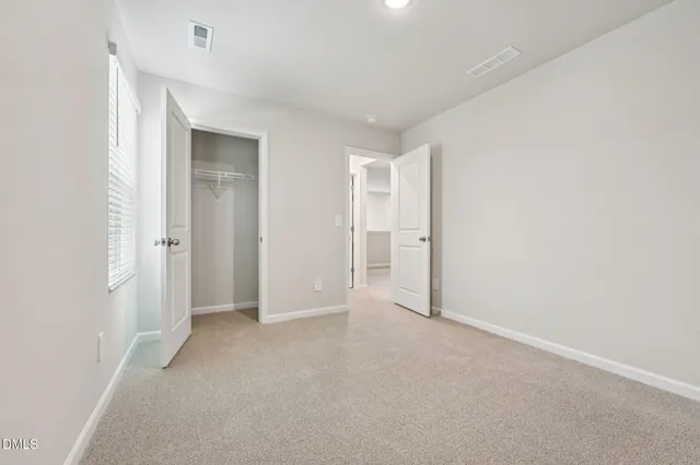 an empty room with closet