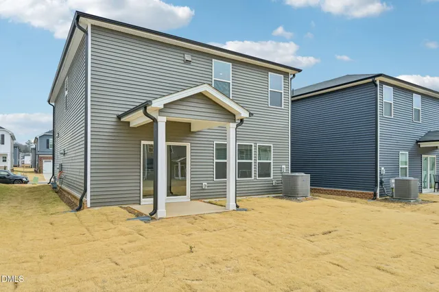 a view of house with space in front of it