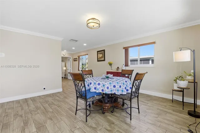 a view of a dining room with furniture