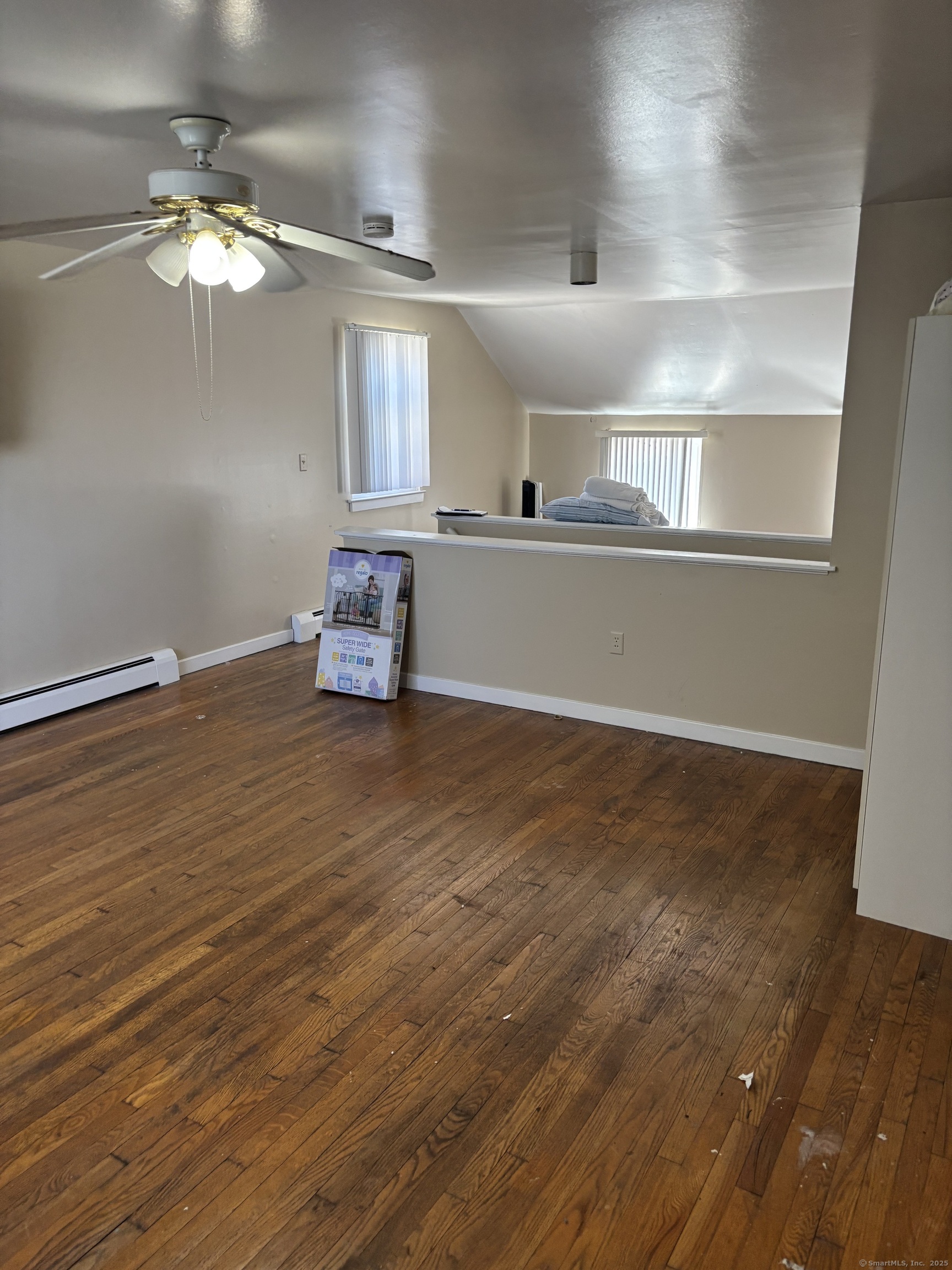 60 Gilmore Street, Unit 21 Bridgeport, CT 06608 - Photo 10 of 13 en empty room with wooden floor