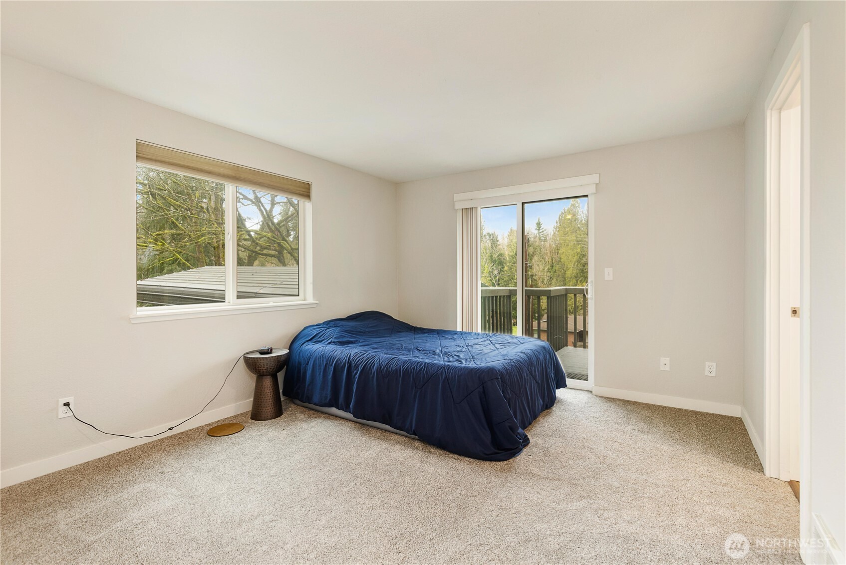 25122 Florence Acres Road Monroe, WA 98272 - Photo 15 of 30 a spacious bedroom with a bed and a window