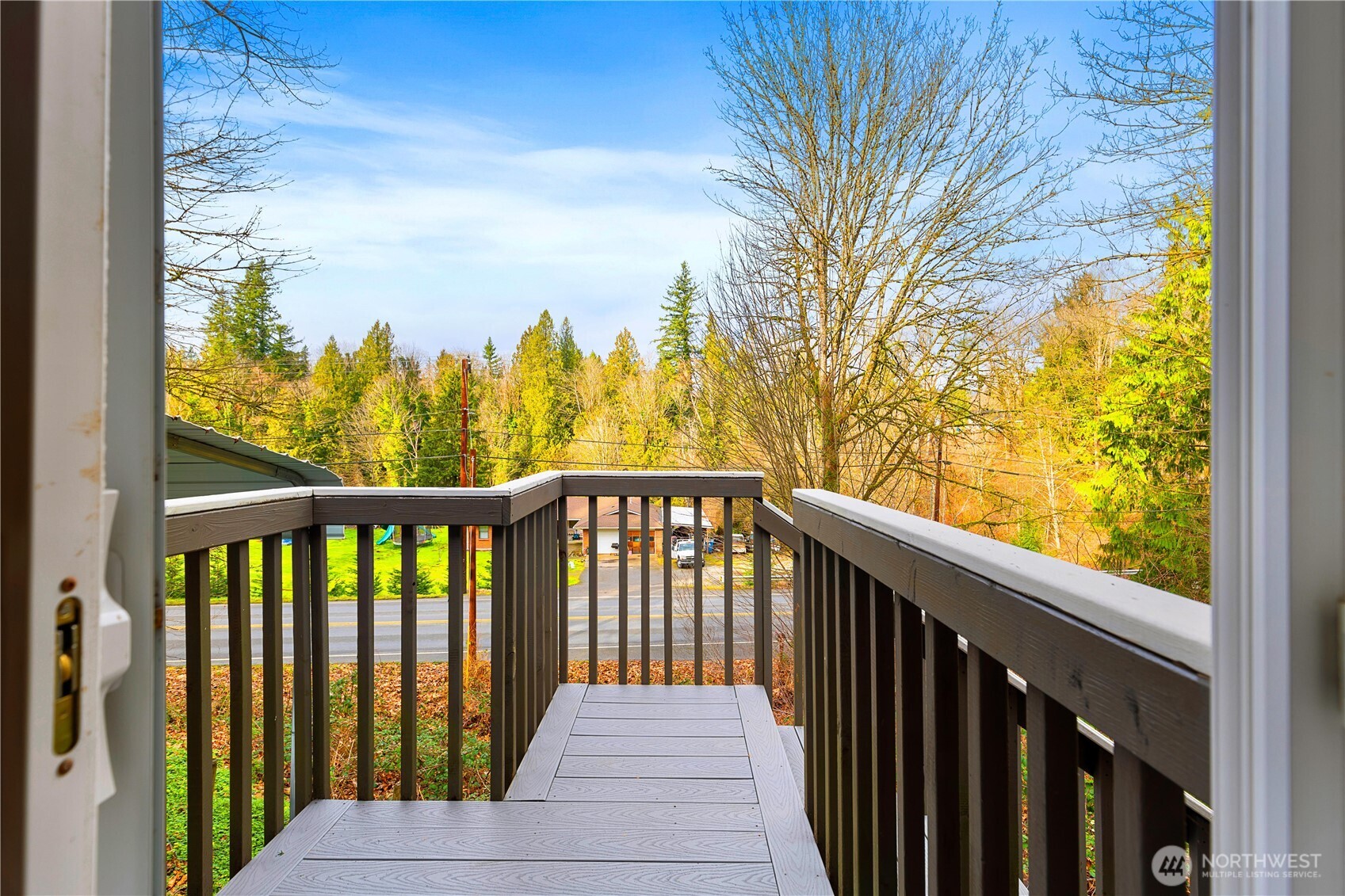 25122 Florence Acres Road Monroe, WA 98272 - Photo 17 of 30 a balcony with wooden floor and fence