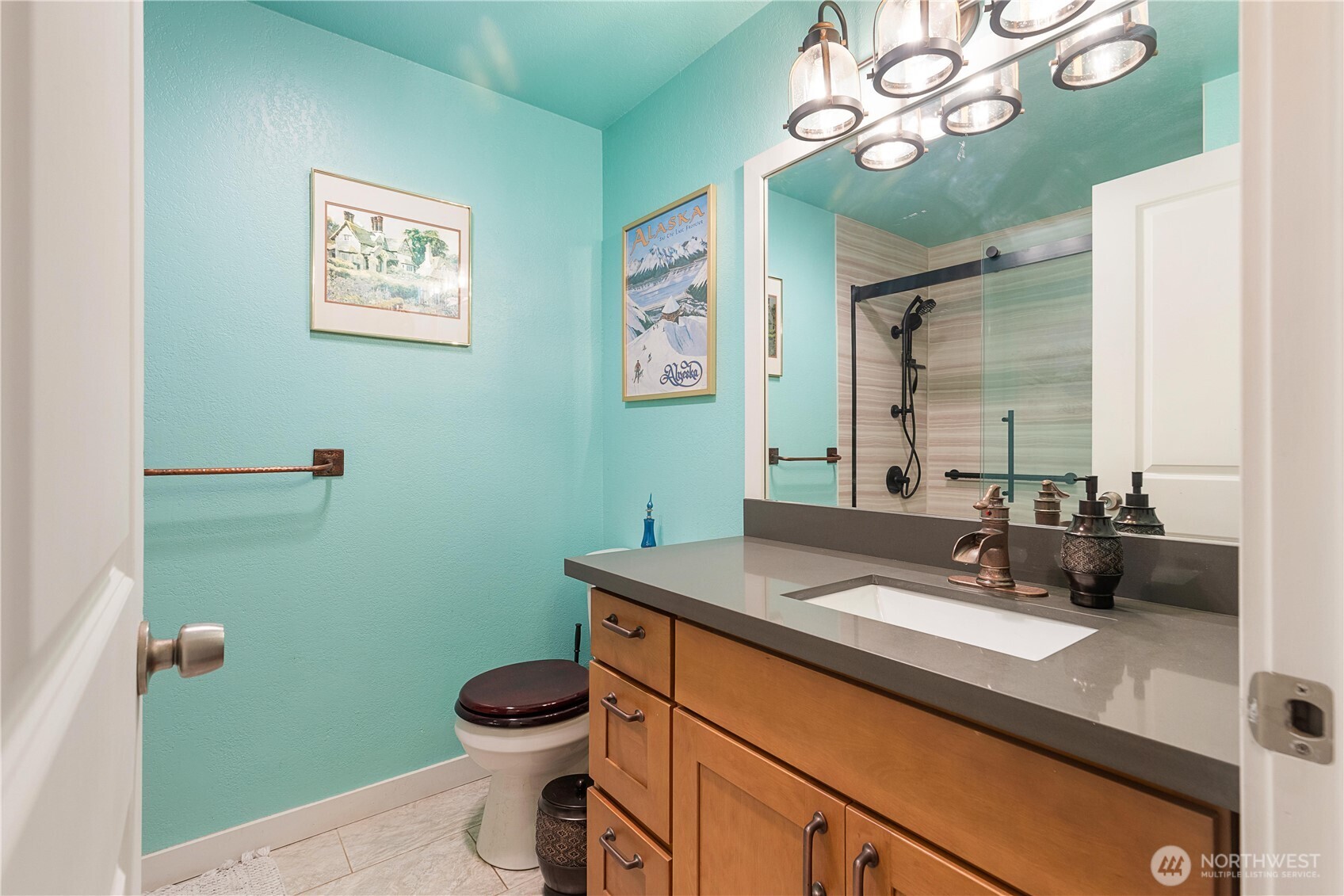25122 Florence Acres Road Monroe, WA 98272 - Photo 20 of 30 a bathroom with a sink a toilet and mirror