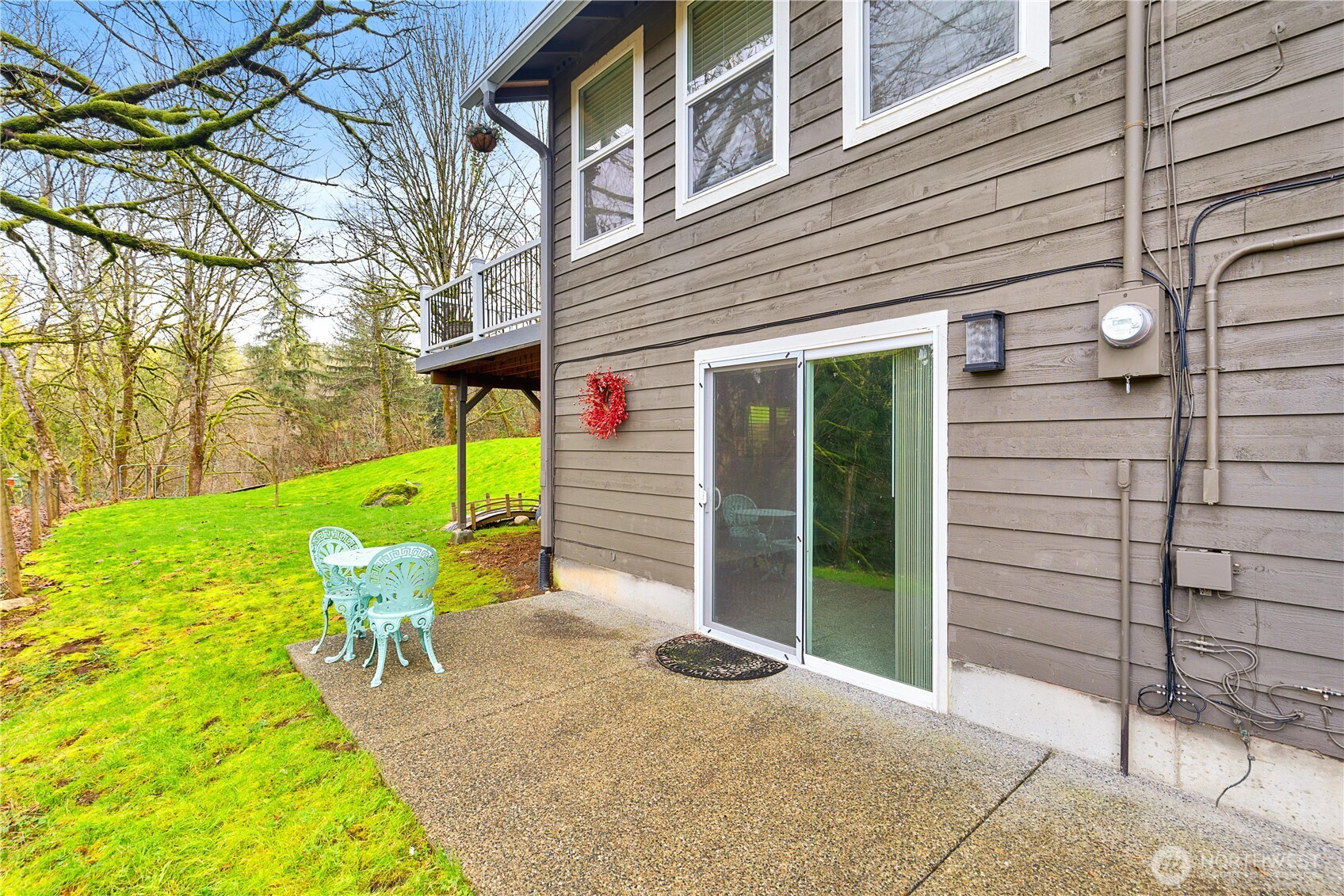 25122 Florence Acres Road Monroe, WA 98272 - Photo 27 of 30 a view of a chair and table in backyard of the house