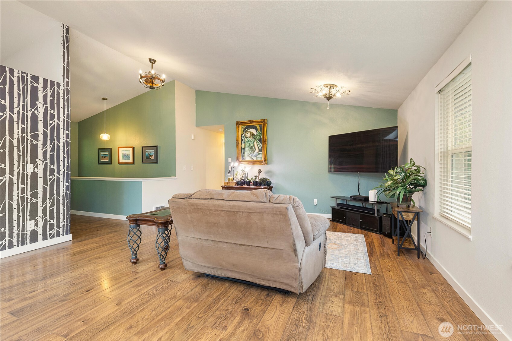 25122 Florence Acres Road Monroe, WA 98272 - Photo 10 of 30 a living room with furniture and a flat screen tv
