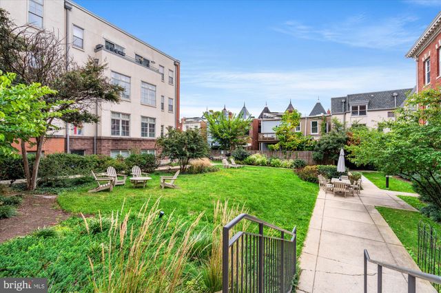 a view of a building with garden