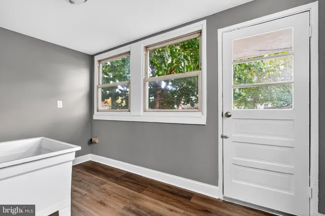 a view of a room that has a window in it