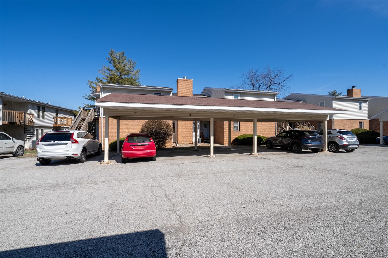 903 North Linden Street, Unit 108 Normal, IL 61761 - Photo 33 of 34 a view of a car parked in front of a building