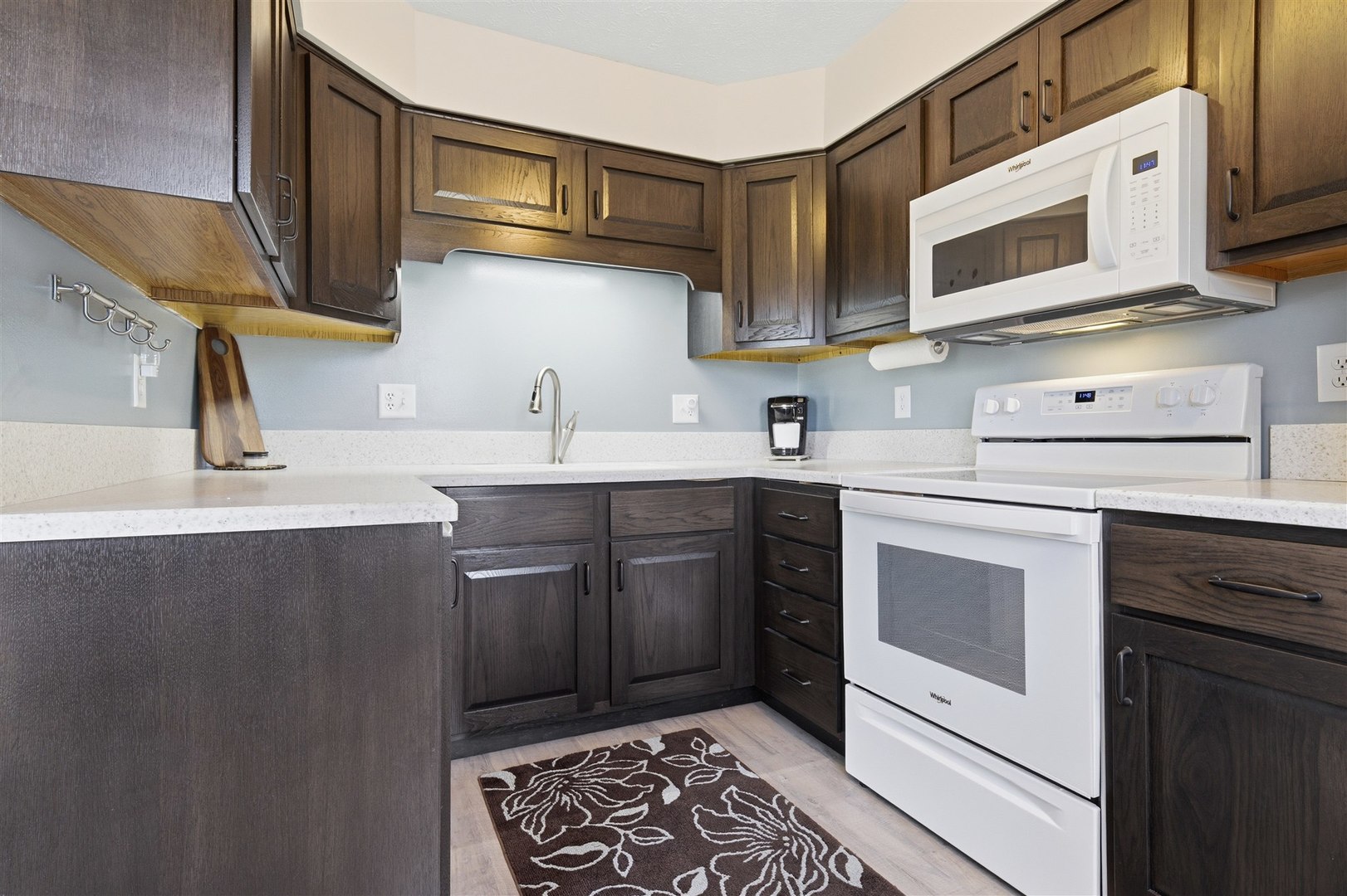 903 North Linden Street, Unit 108 Normal, IL 61761 - Photo 6 of 34 a kitchen with stainless steel appliances a stove sink and cabinets