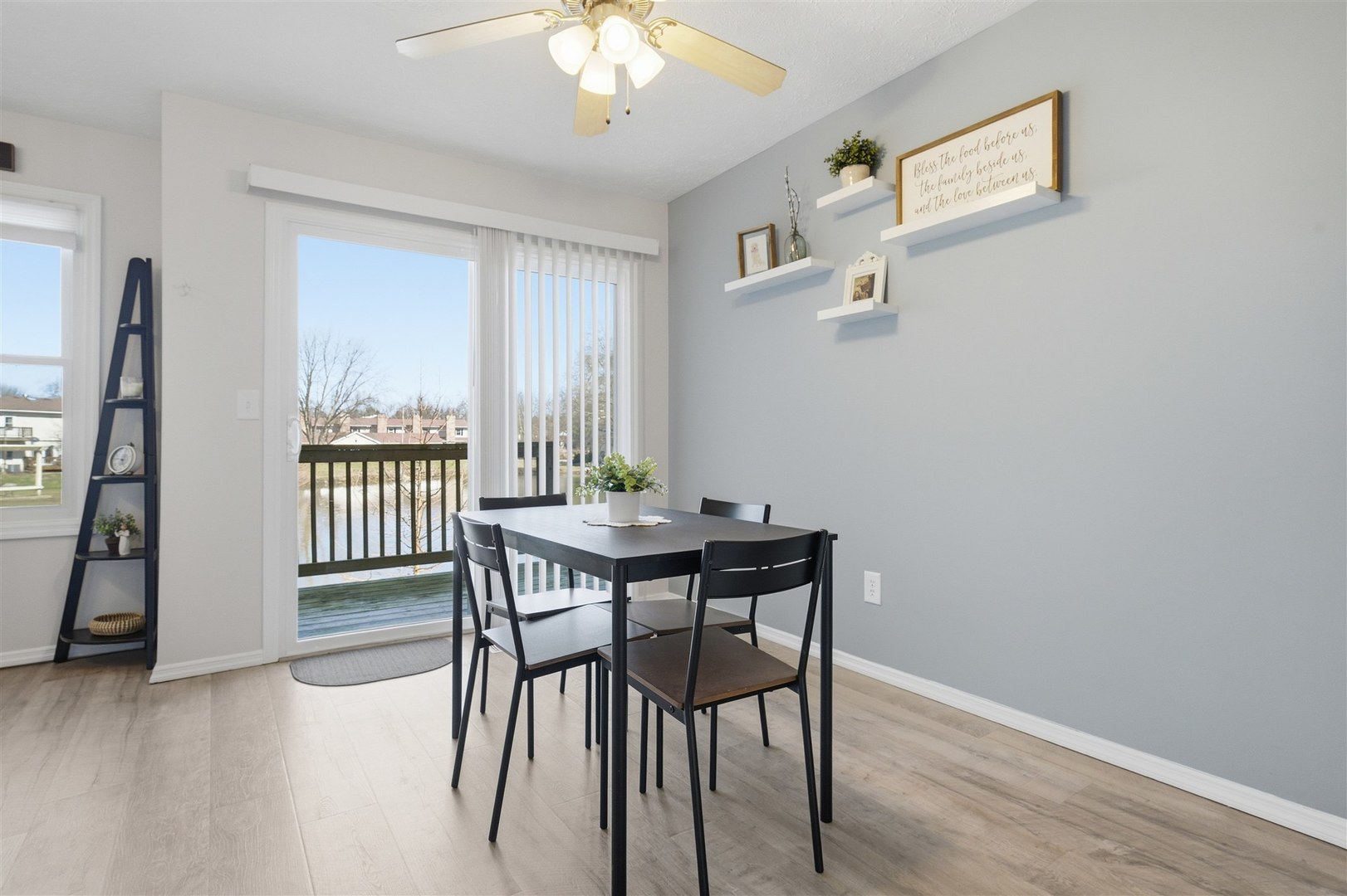 903 North Linden Street, Unit 108 Normal, IL 61761 - Photo 9 of 34 a view of a dining room with furniture window and wooden floor