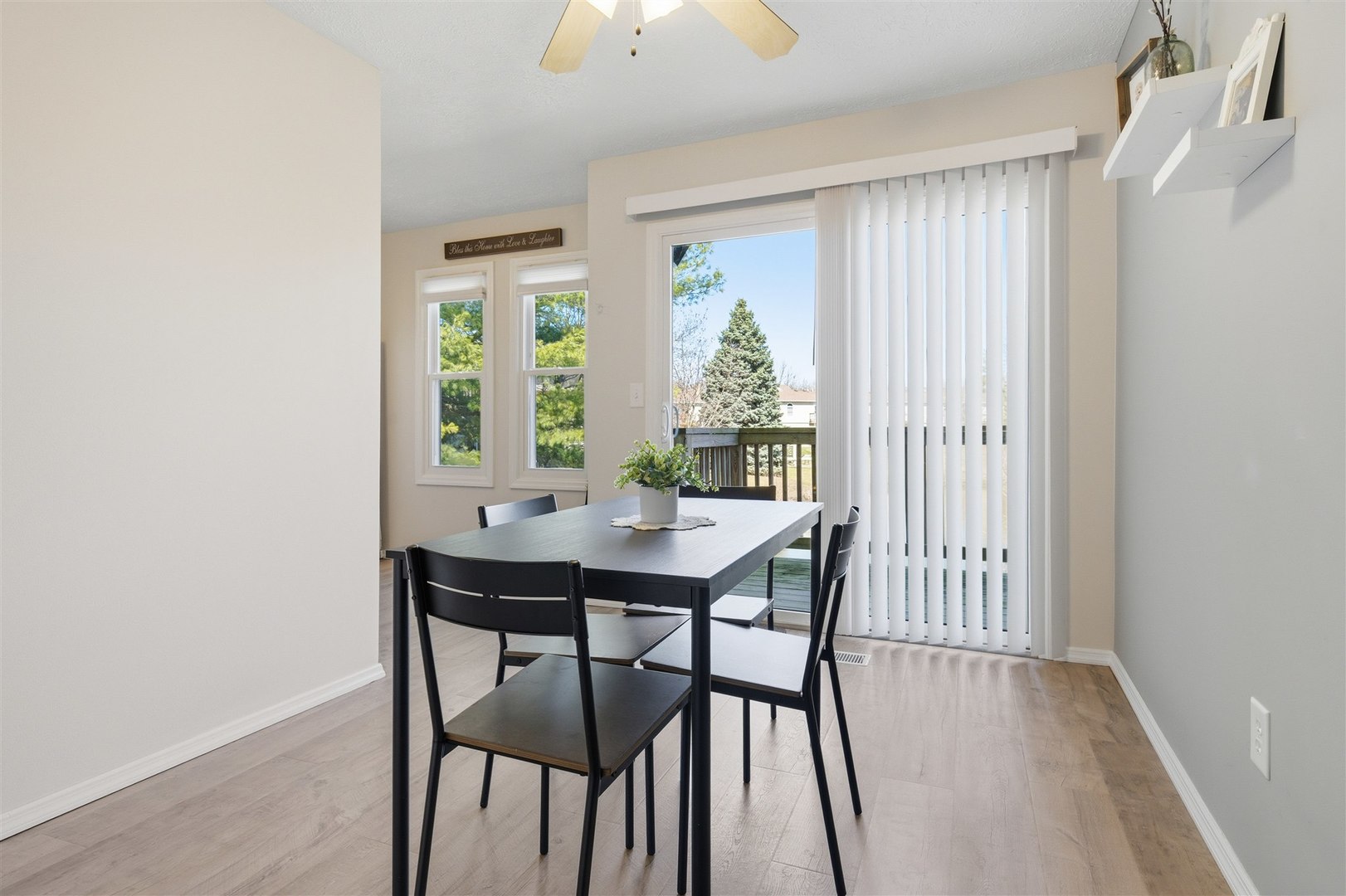903 North Linden Street, Unit 108 Normal, IL 61761 - Photo 10 of 34 a view of a dining room with furniture and window