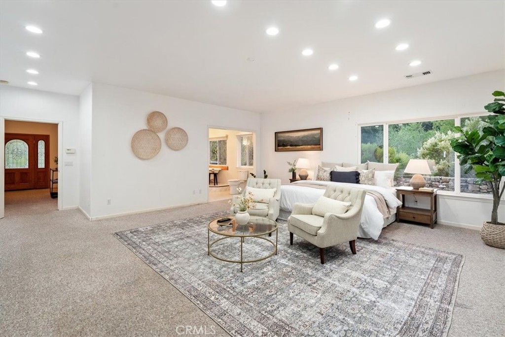 4242 Las Tablas Willow Creek Road Paso Robles, CA 93446 - Photo 13 of 58 a bed room with furniture and a large window