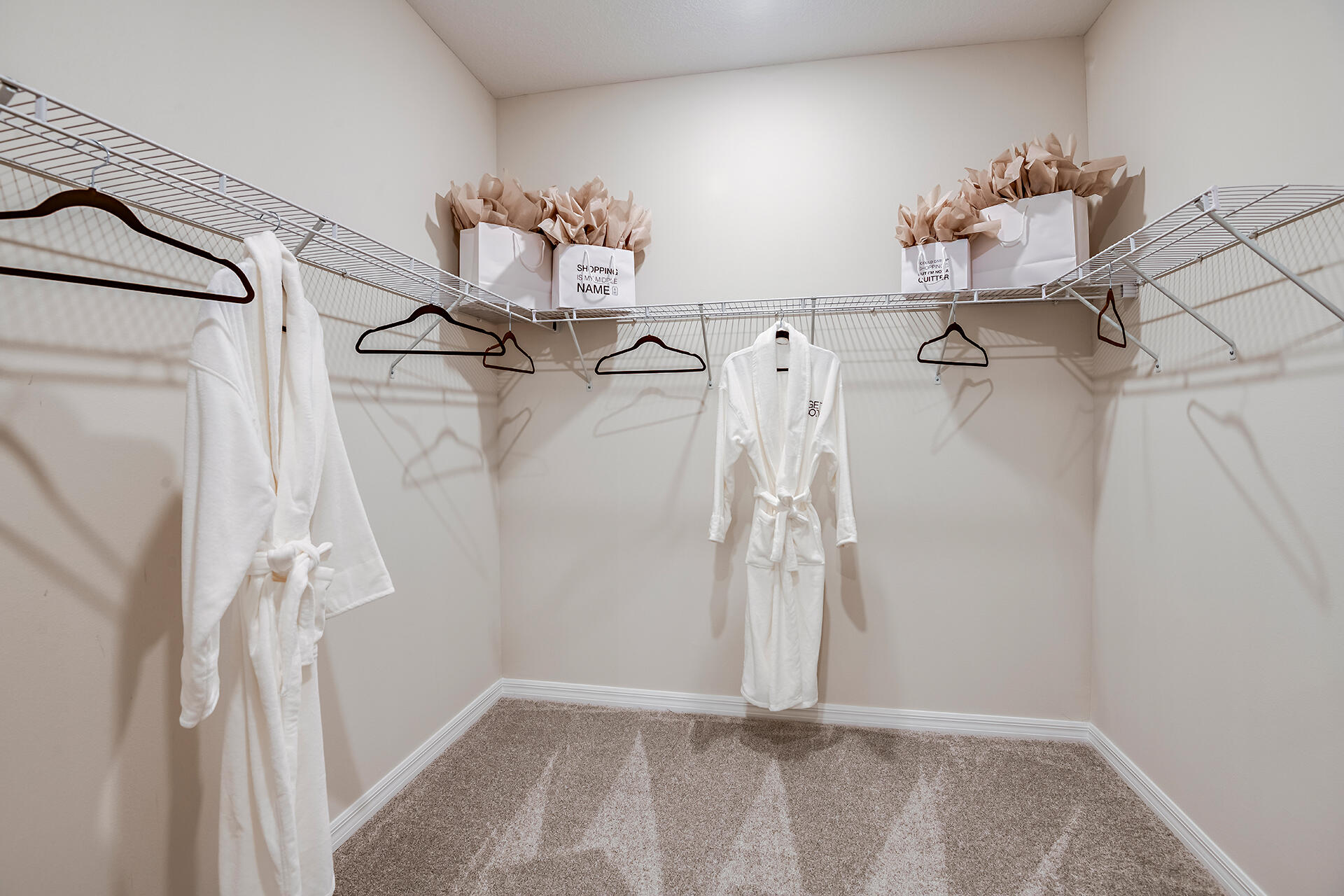 593 Southeast Ranch Oak Circle Port St. Lucie, FL 34984 - Photo 14 of 35 a view of a room with racks on the wall
