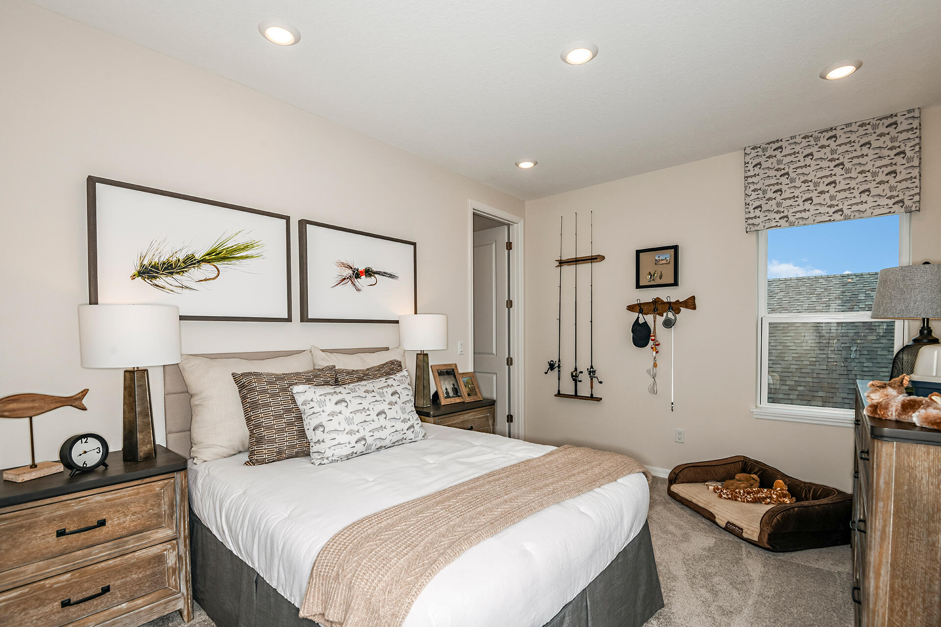 593 Southeast Ranch Oak Circle Port St. Lucie, FL 34984 - Photo 21 of 35 a bedroom with a bed and a painting on the wall