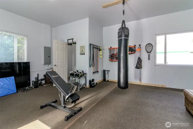 a white toilet sitting next to a bathroom sink