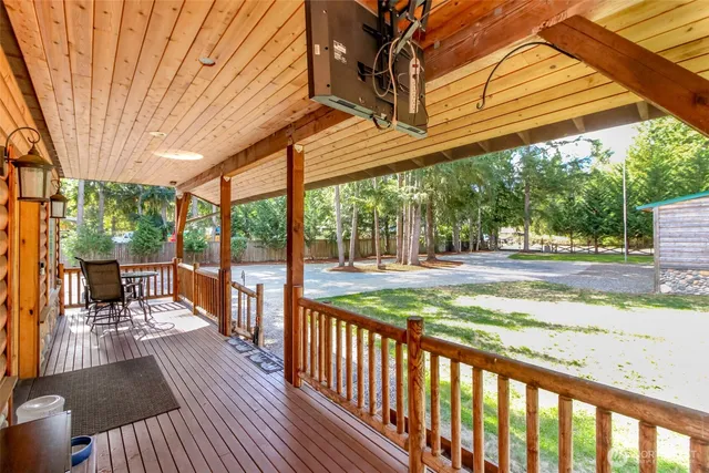 a view of porch with wooden floor and outdoor seating