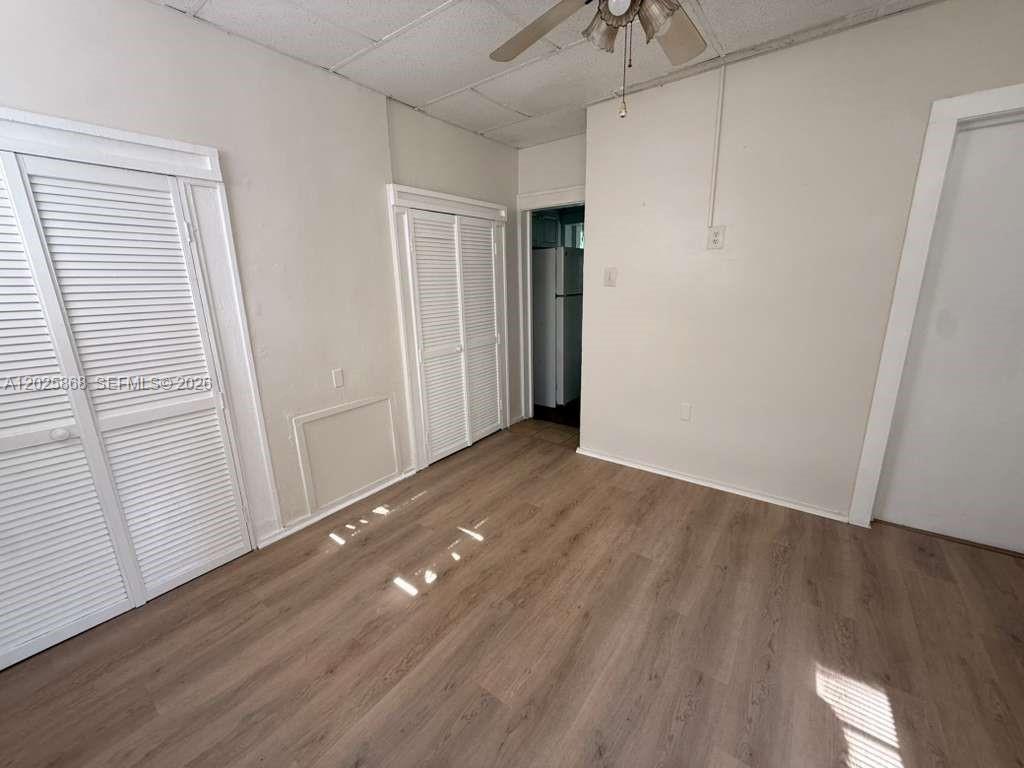 1919 Southwest 2nd Street, Unit B Miami, FL 33135 - Photo 9 of 12 a view of an empty room with wooden floor