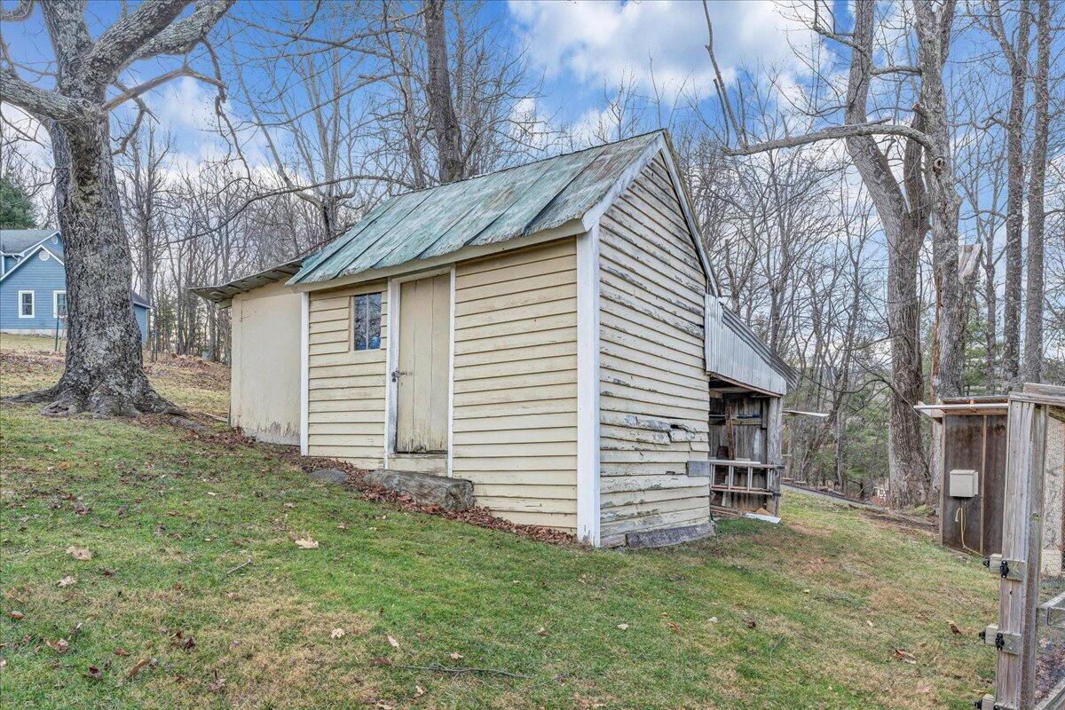 9009 Poor Mountain Road Bent Mountain, VA 24059 - Photo 27 of 30 a view of a house with a yard