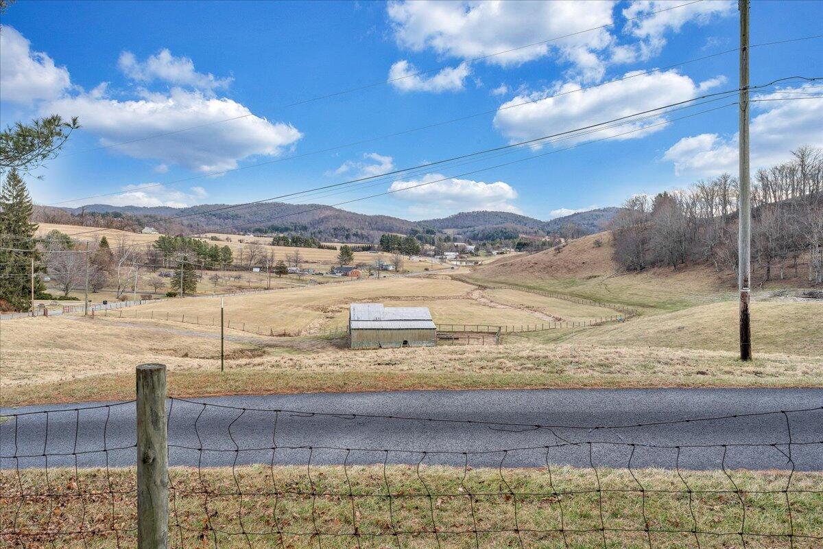 9009 Poor Mountain Road Bent Mountain, VA 24059 - Photo 30 of 30 a view of a yard and an ocean