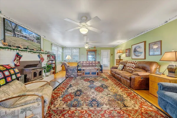 a bed room with furniture and a chandelier